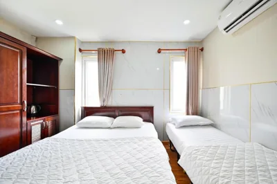 Chambre Deluxe triple — Gia Hoa Airport Hotel